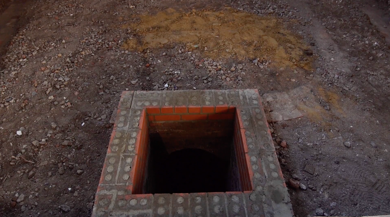 This hidden entranceway was found beneath large slabs weighing as much as 3,300 pounds. (Image: Garden Museum)